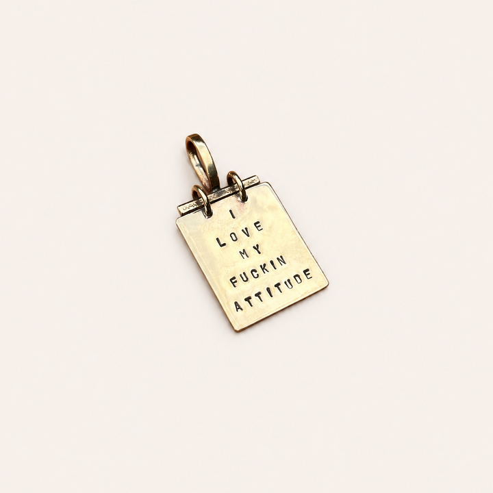 Placa “Y love my fuckin attitude” Bronce